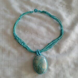 Beatuful 1970's polished stones cords necklace in ocean tones